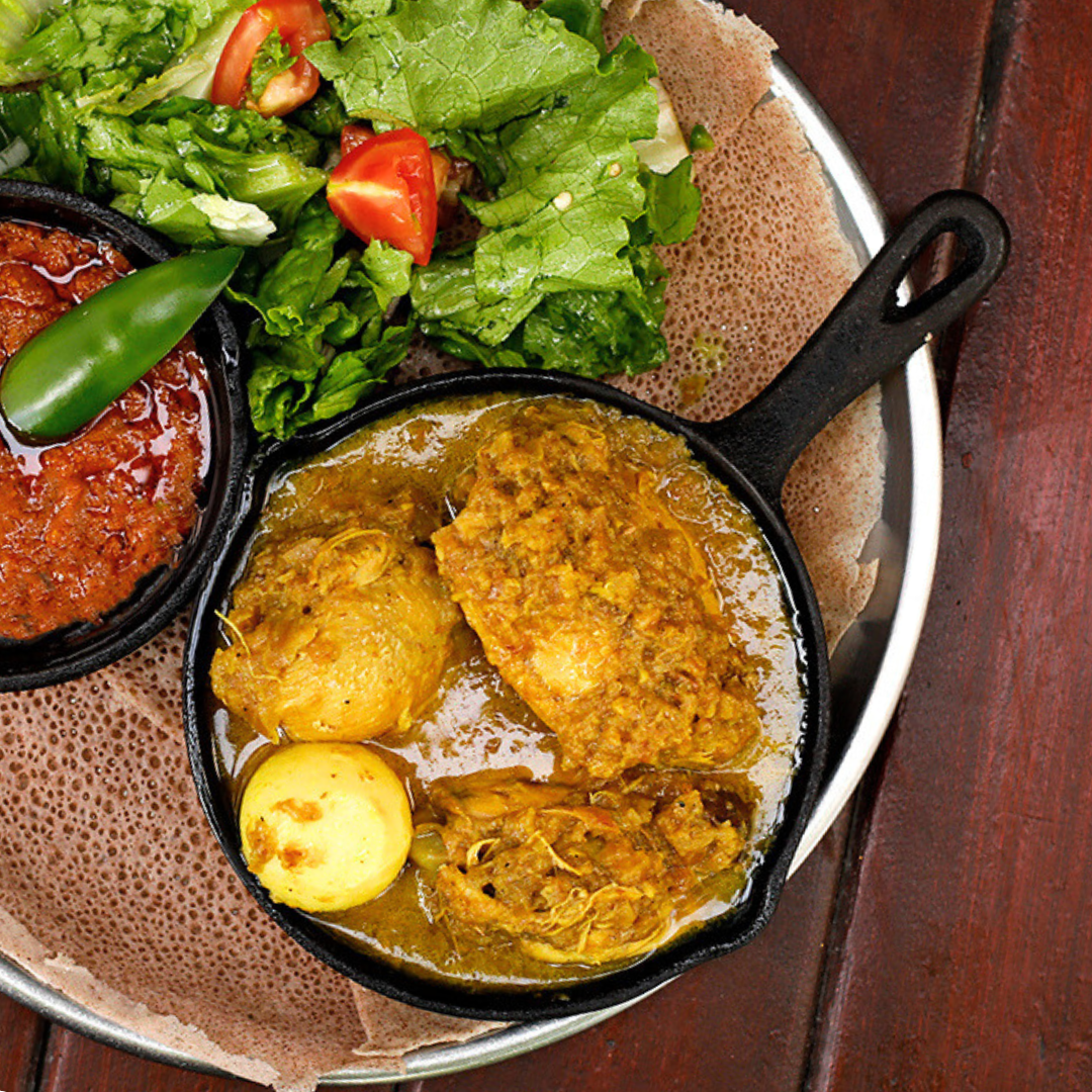 Doro Alicha (chicken Stewed in Turmeric) with hard boiled eggs