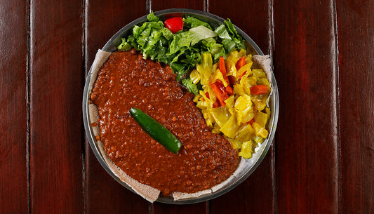 Misser Wot (Spicy Berbere Red Lentils), served with atakilt over injera