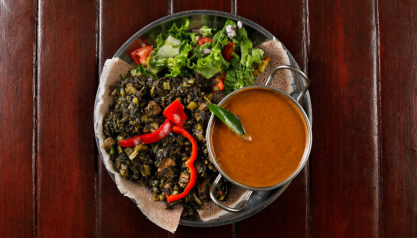 Gomen made with Brundo Spice Company Korerima, Ethiopian Black Cardamom
